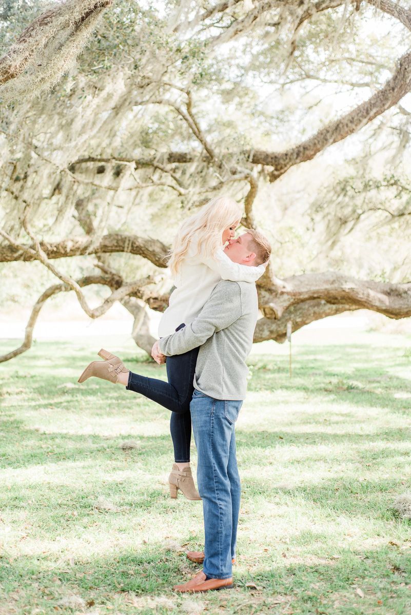a couple cuddling at engagement session