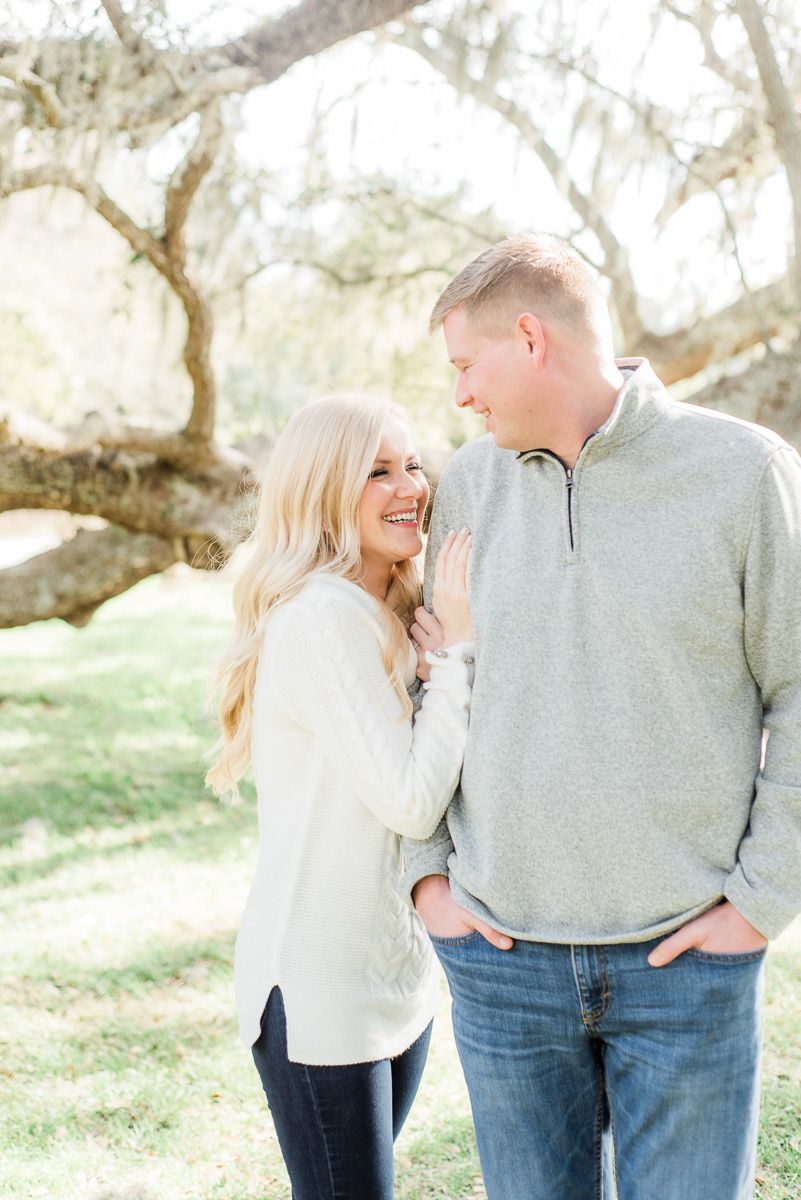 a couple cuddling at engagement session