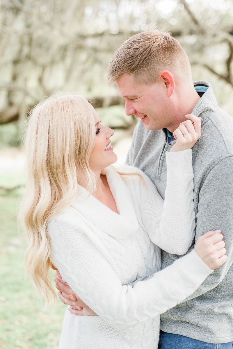 a couple with Spanish moss in Texas