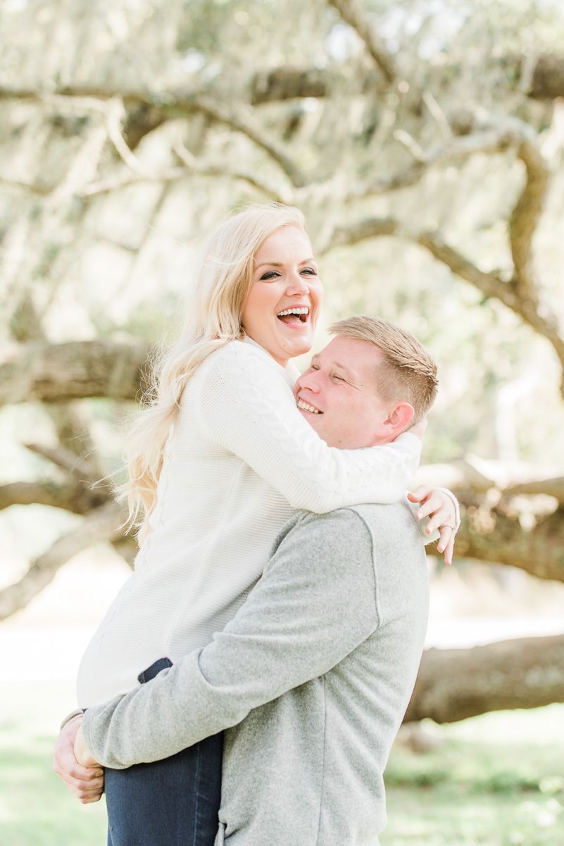 a couple with Spanish moss in Texas