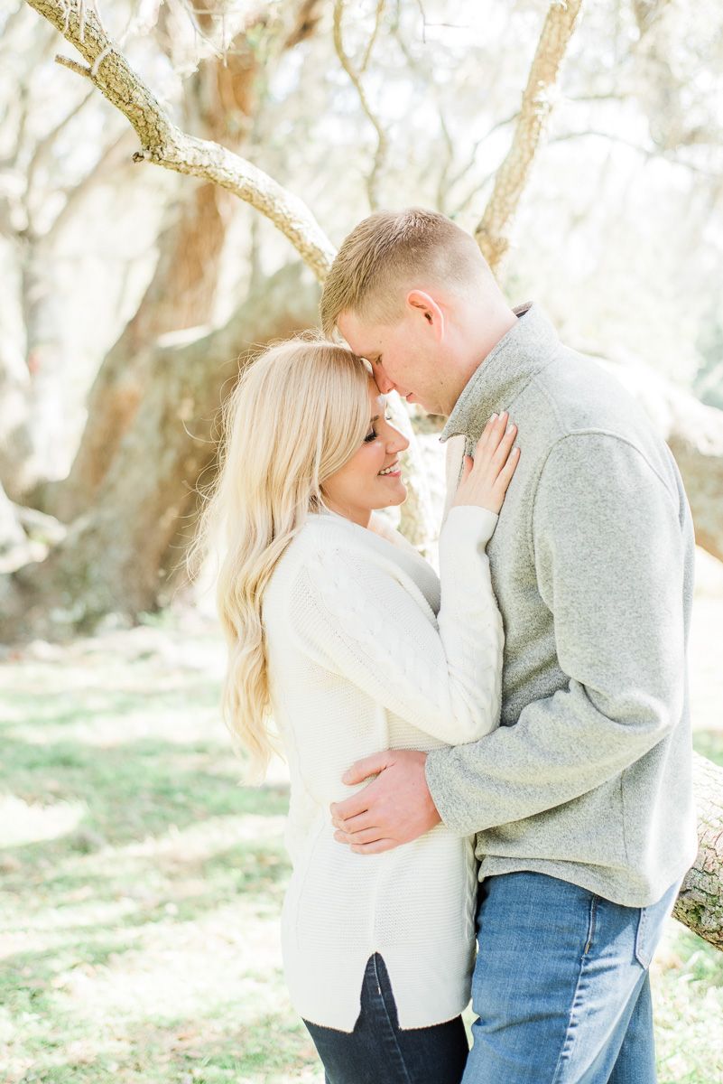 a couple with Spanish moss in Texas