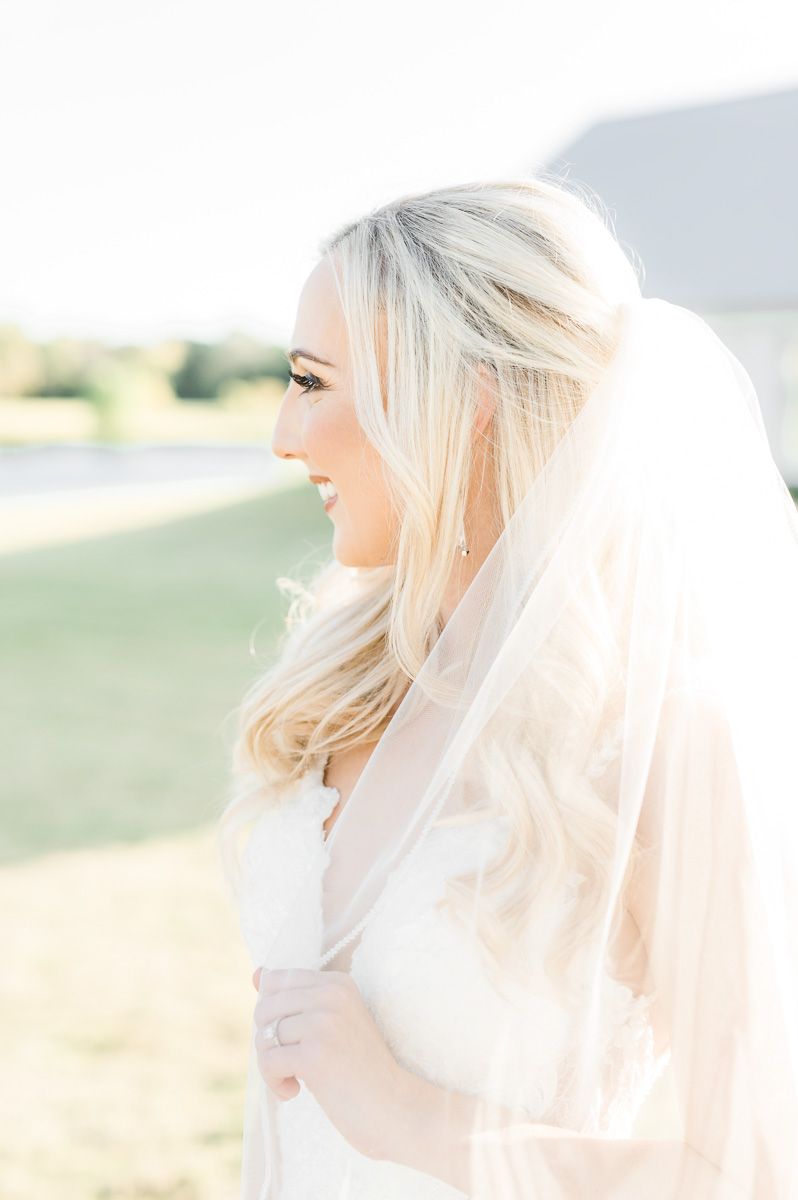 bride holding her veil