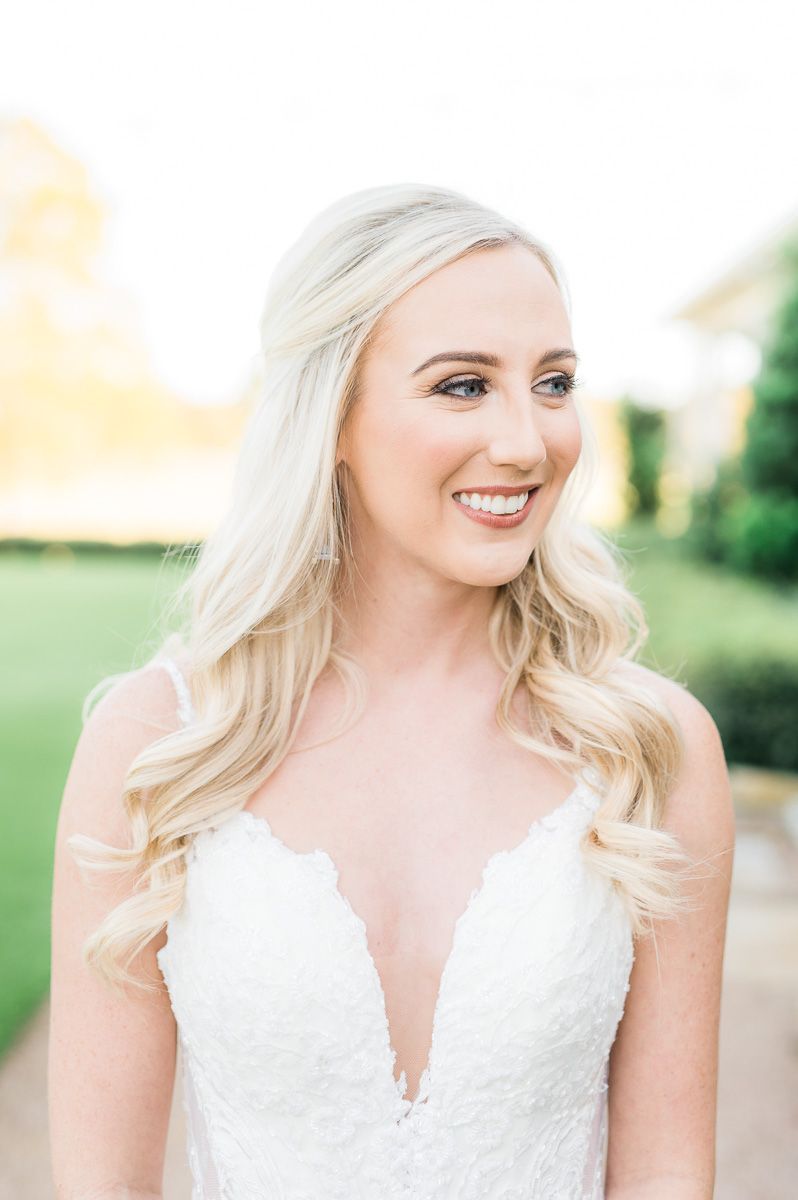 bride posing at her bridal session at The Farmhouse