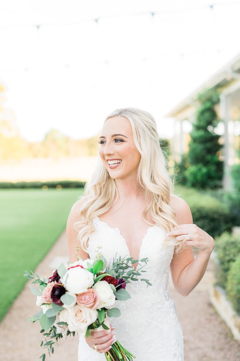 bride posing at her bridal session at The Farmhouse