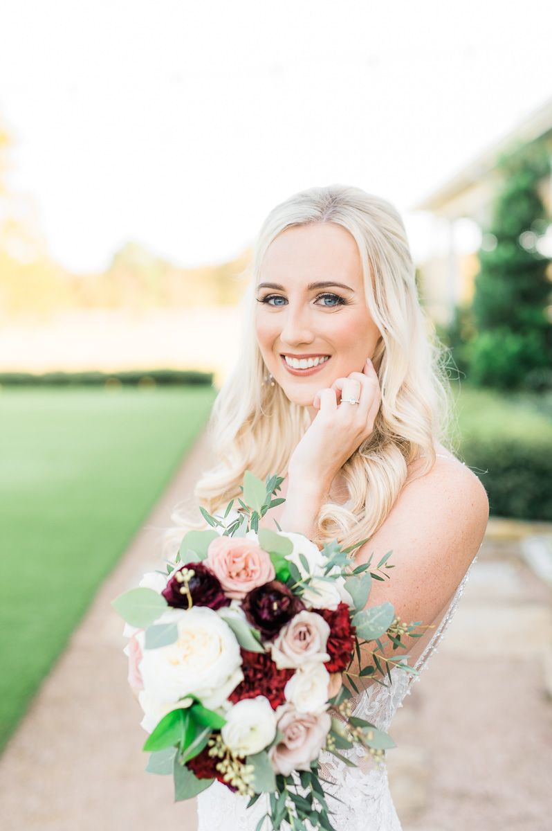 bride posing at her bridal session at The Farmhouse