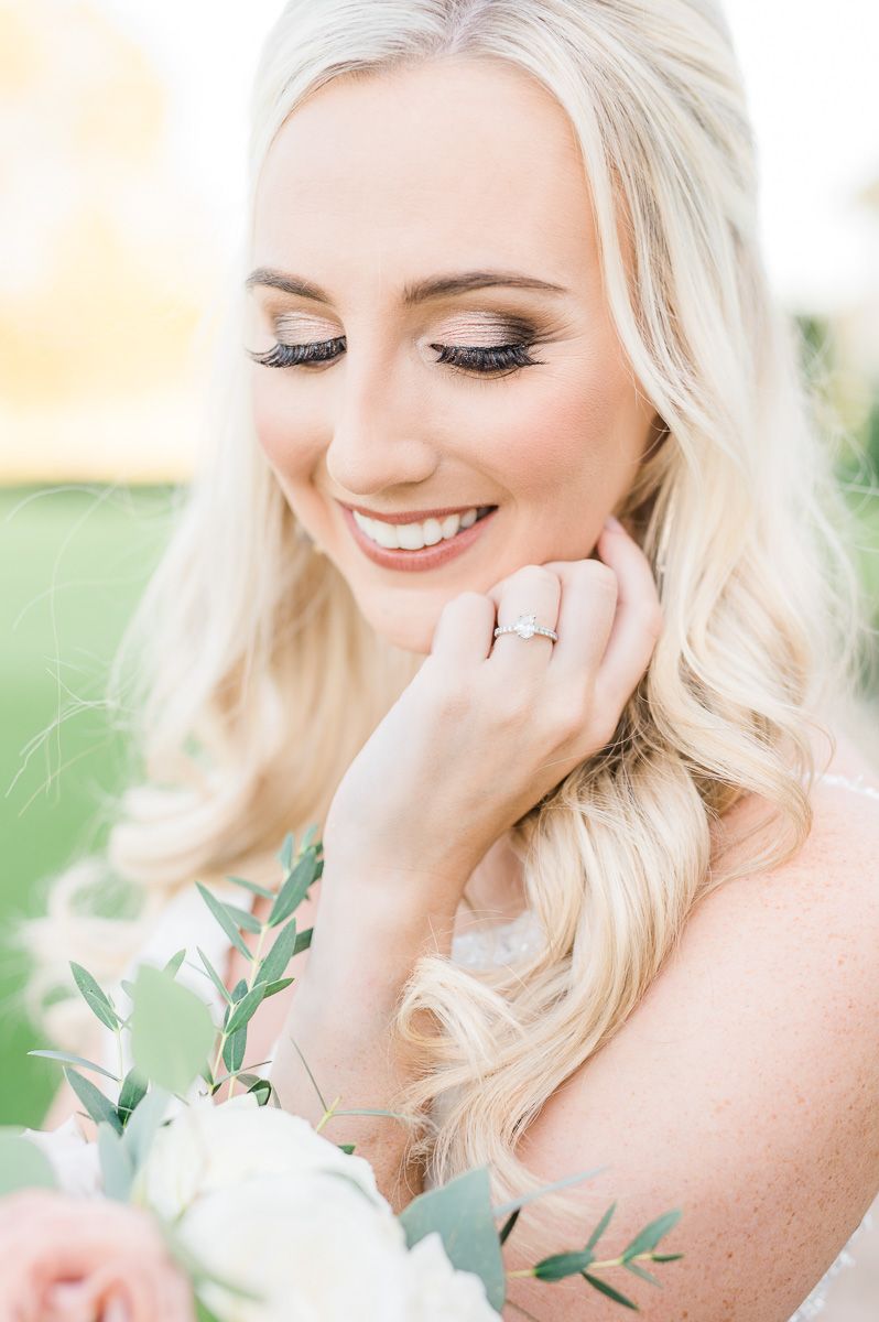 bride posing at her bridal session at The Farmhouse