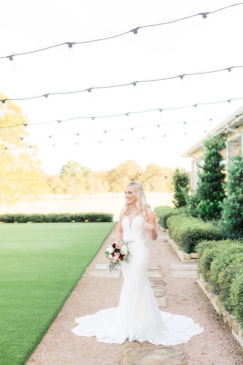 bride posing at her bridal session at The Farmhouse