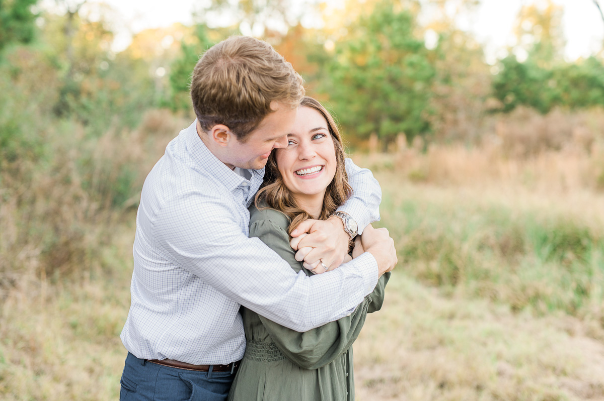 couple posing for engagement photos