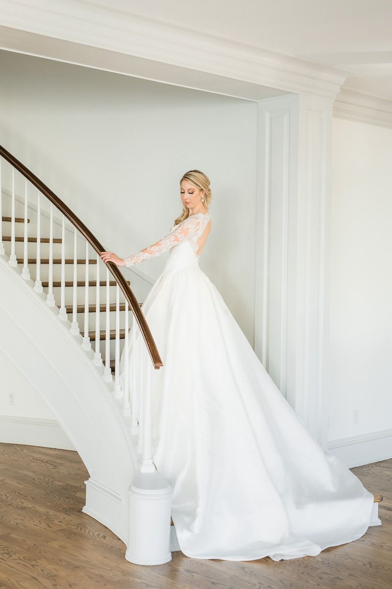 bride on staircase at The Creative Chateau