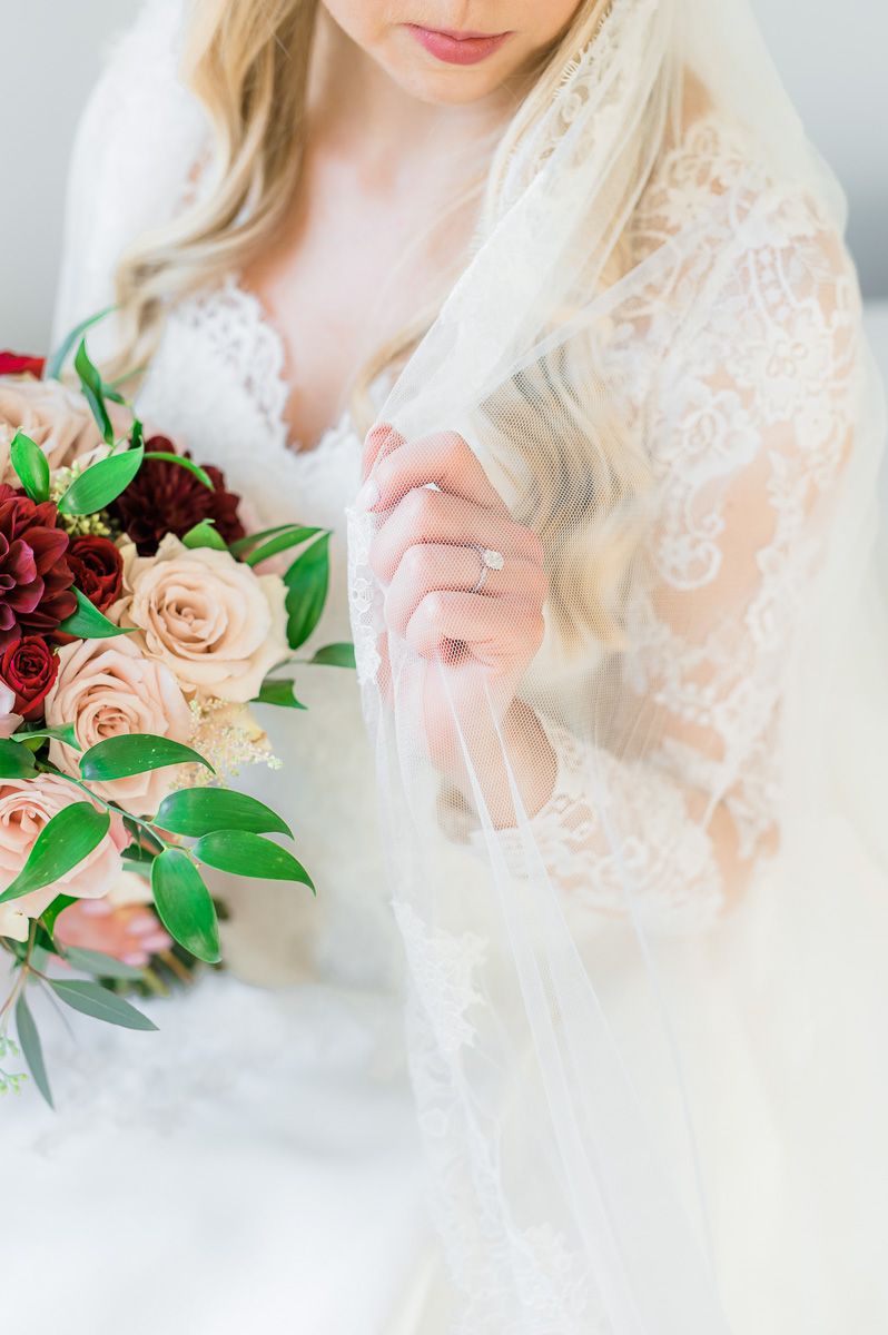 bride holding veil