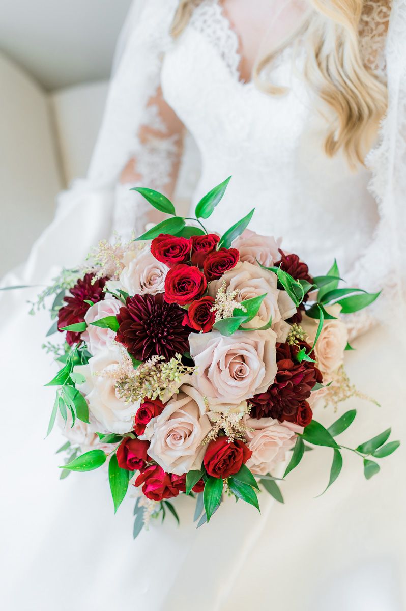 bride with veil and flowers