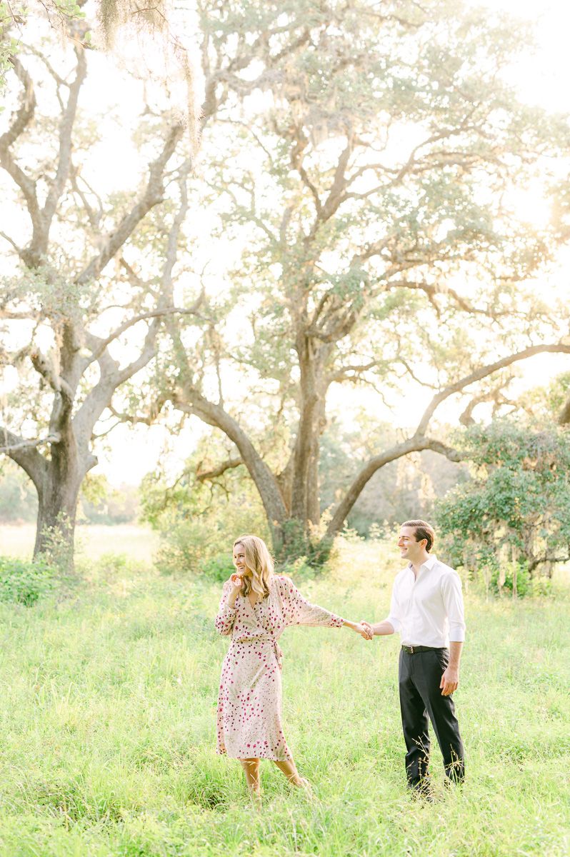 couple walking during engagement photos