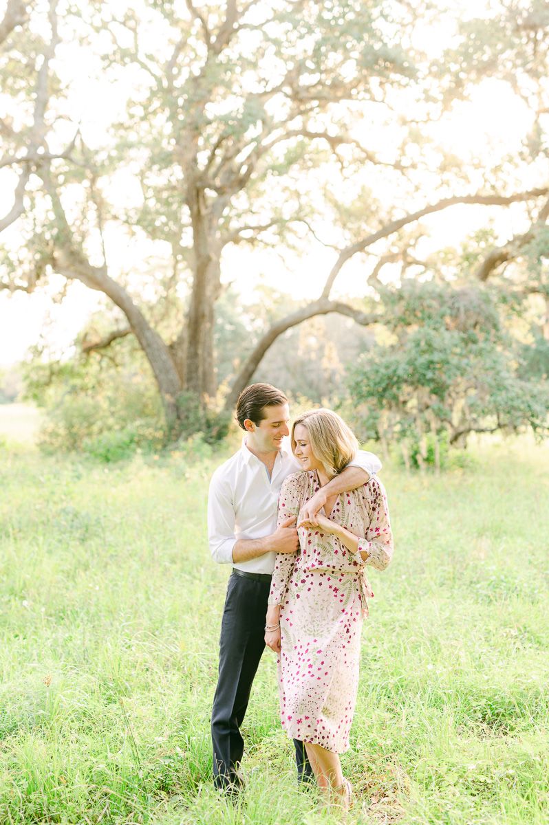 couple cuddling during engagement photos