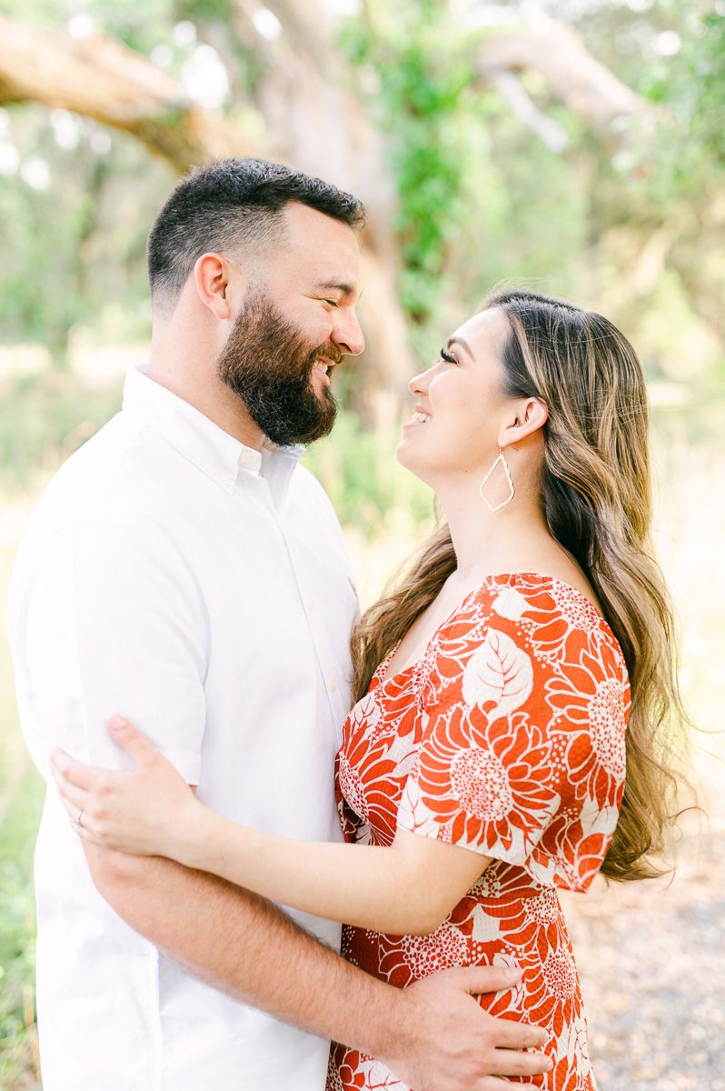 Couple posing for engagement photos