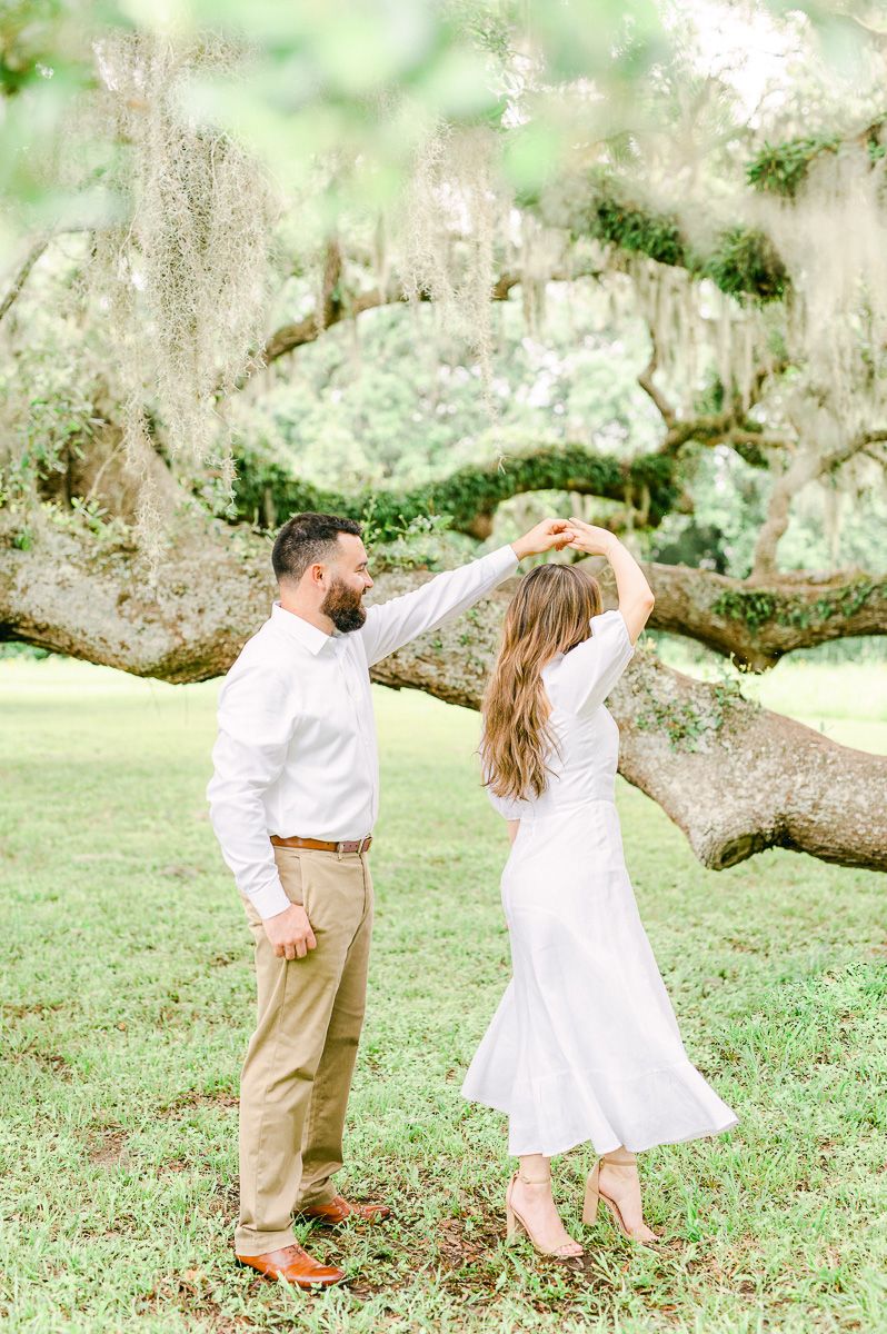couple dancing during engagement photos