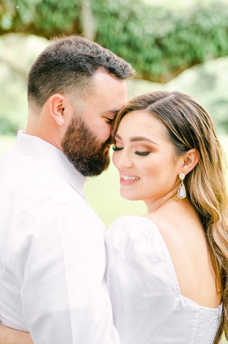 couple posing during engagement photo session