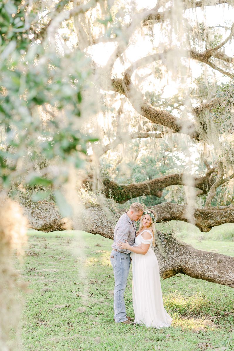 maternity session with flower crown and Spanish moss