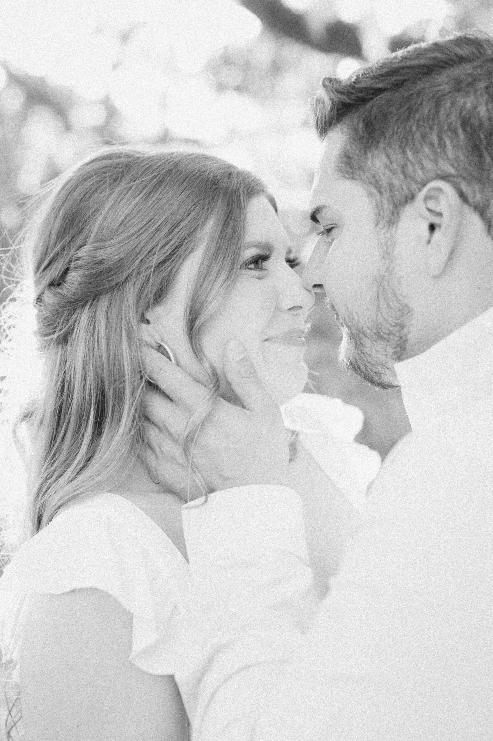 couple cuddling during engagement photos