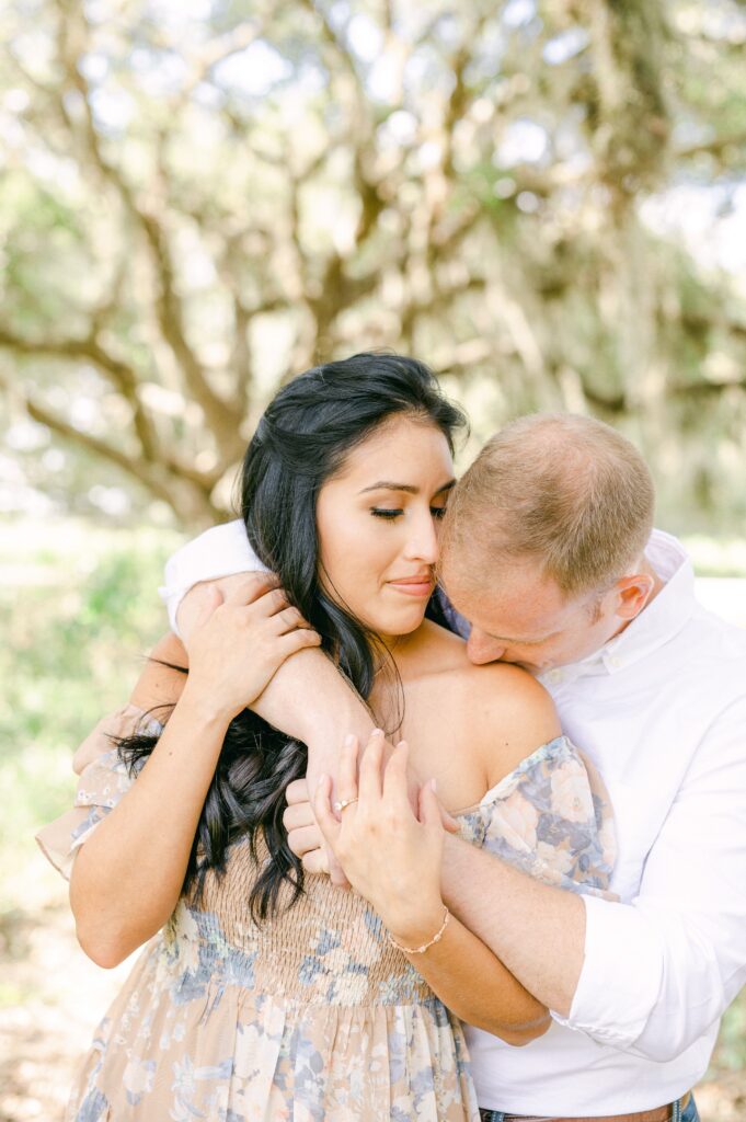 romantic engagement session with Spanish moss