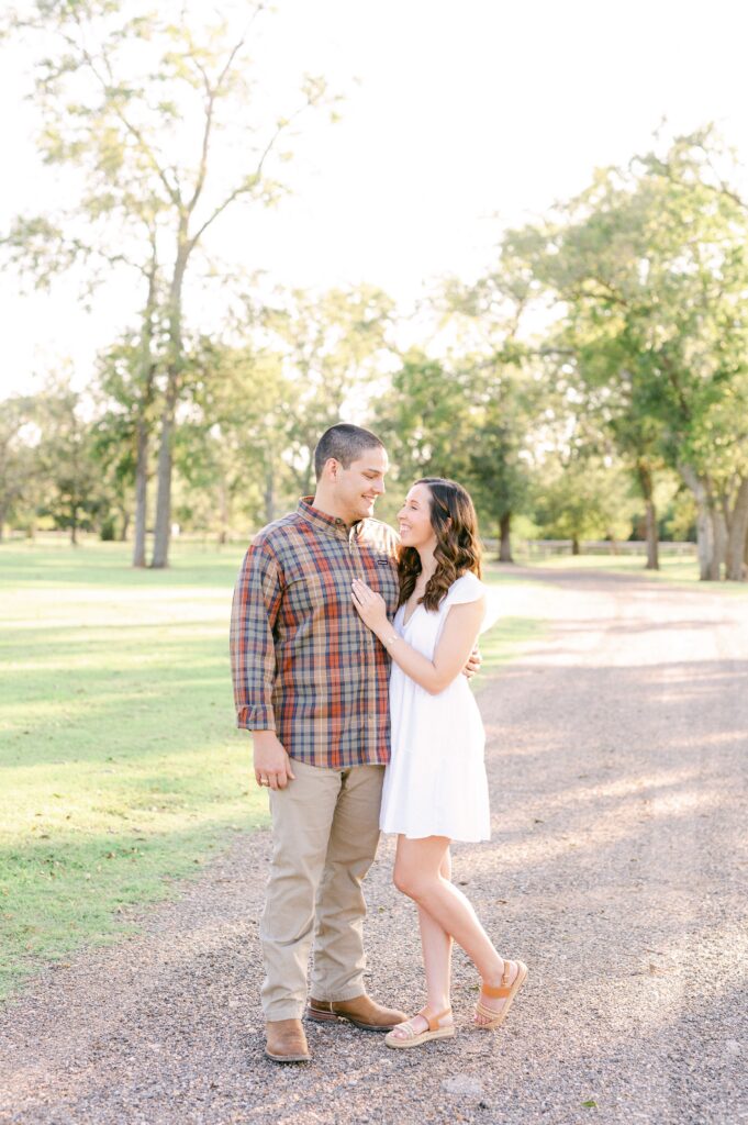 couple cuddling during Katy Tx Engagement