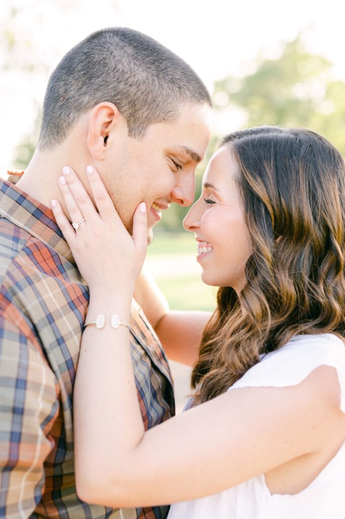 couple cuddling during Katy Tx Engagement