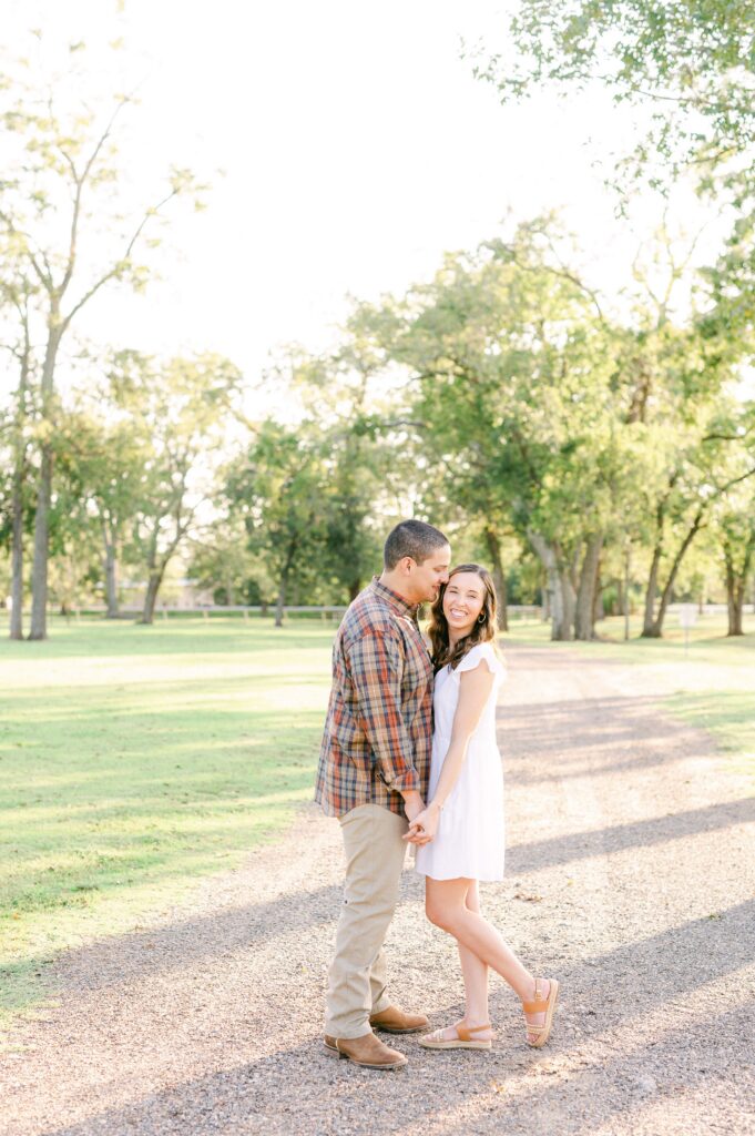 couple cuddling during Katy Tx Engagement