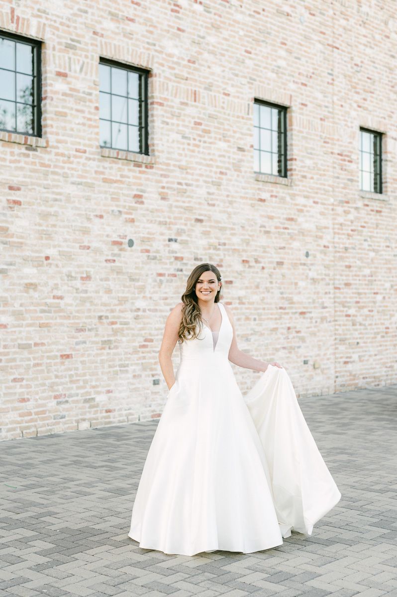 bride wearing wedding dress with pockets