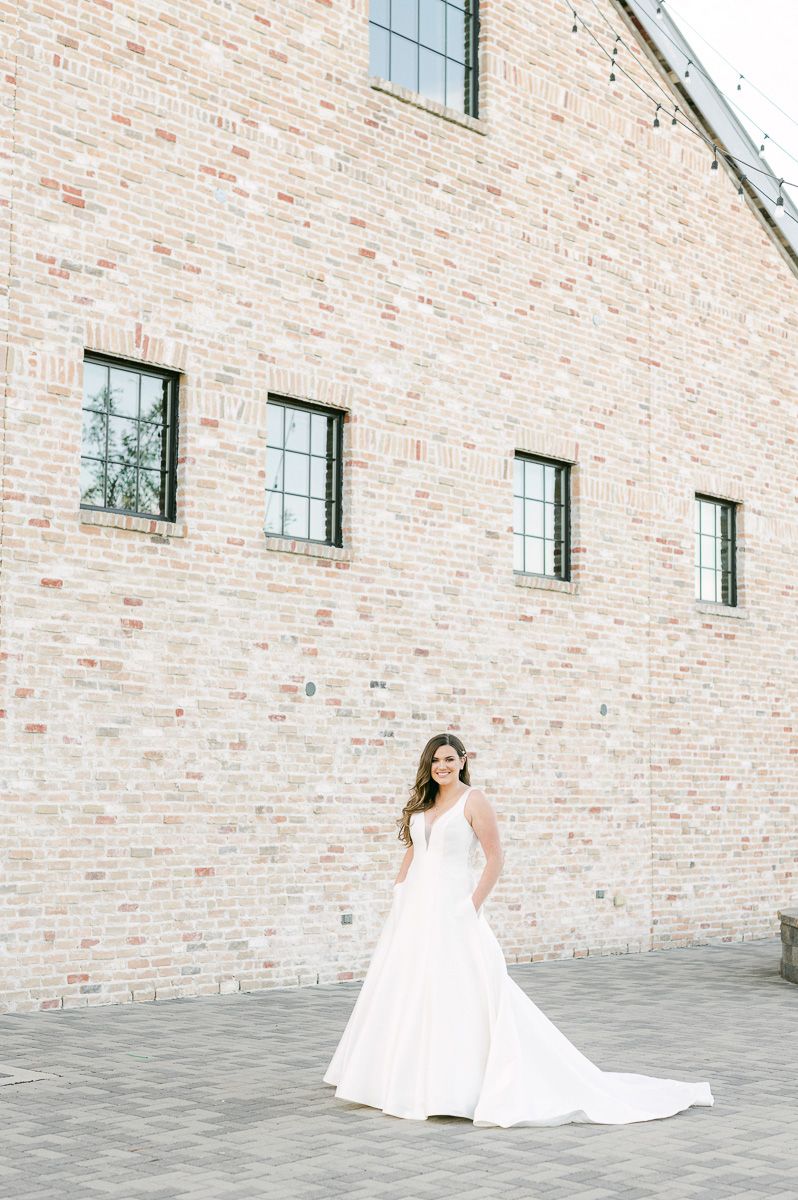 bride wearing wedding dress with pockets