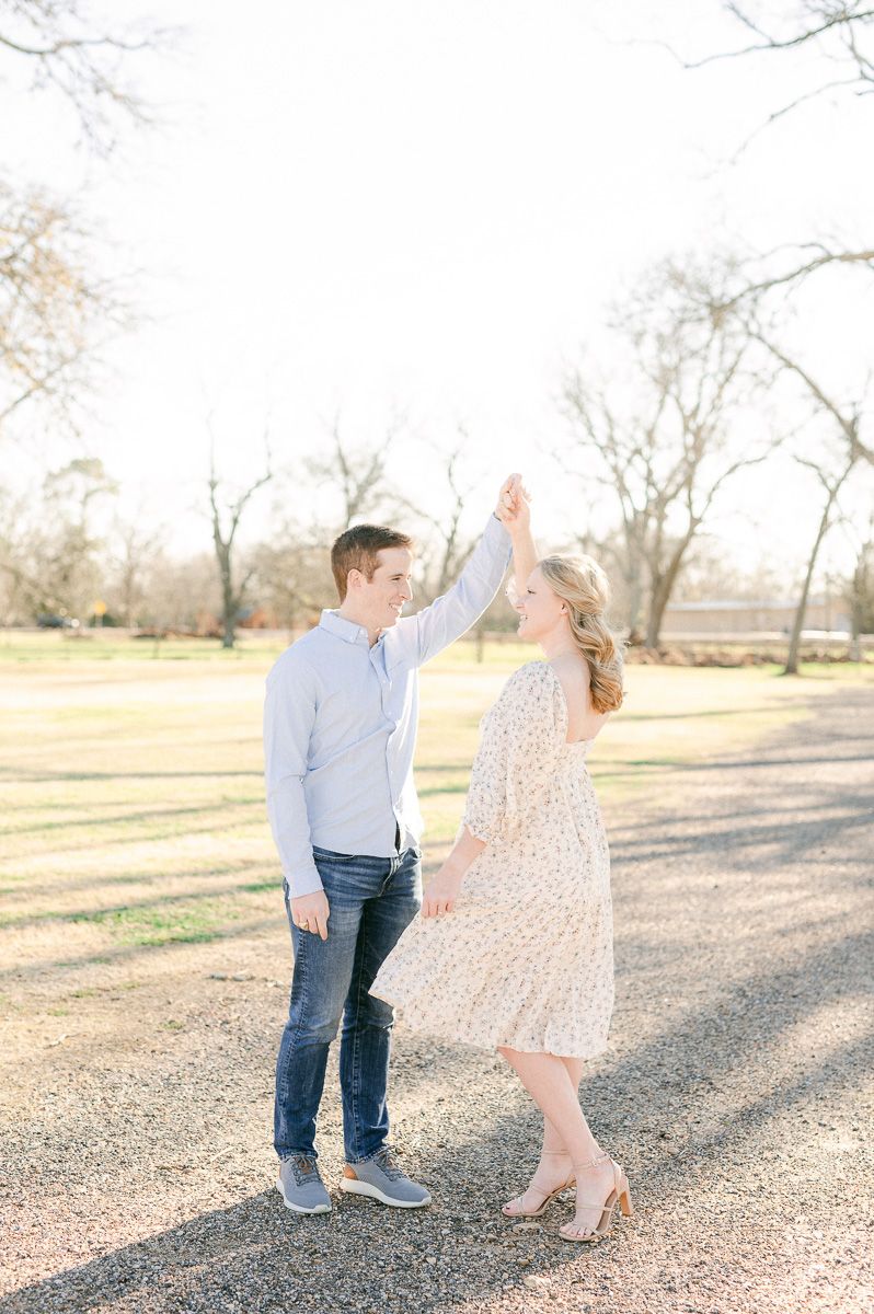Engaged couple dancing during Richmond engagement session