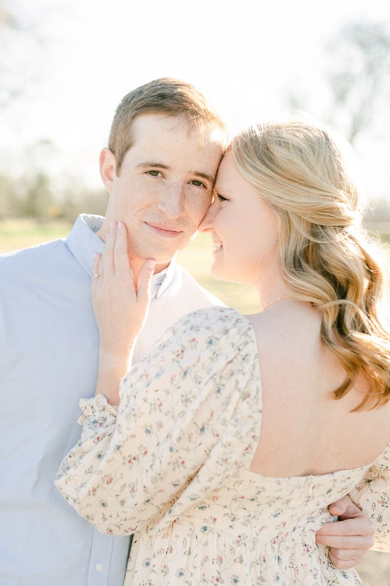 Couple cuddling during engagement session