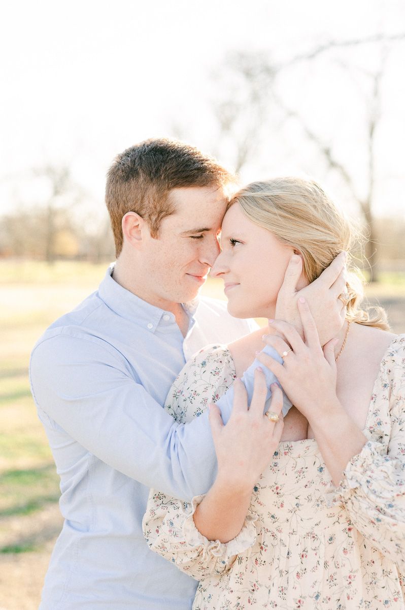 Couple cuddling during engagement session