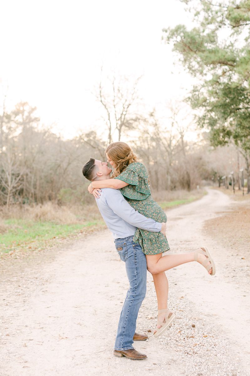 Couple cuddling during their Cypress engagement session