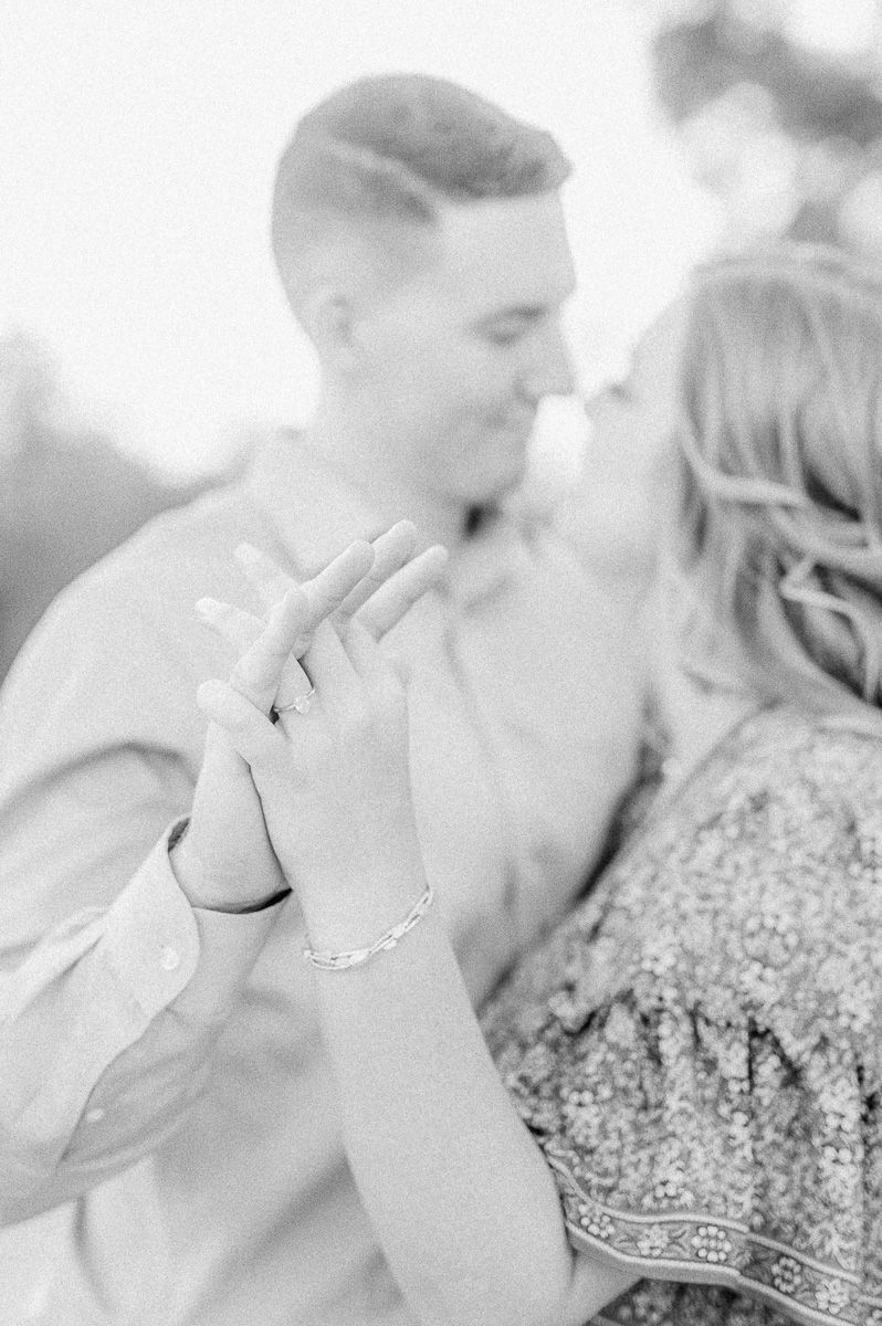 Couple cuddling during their Cypress engagement session