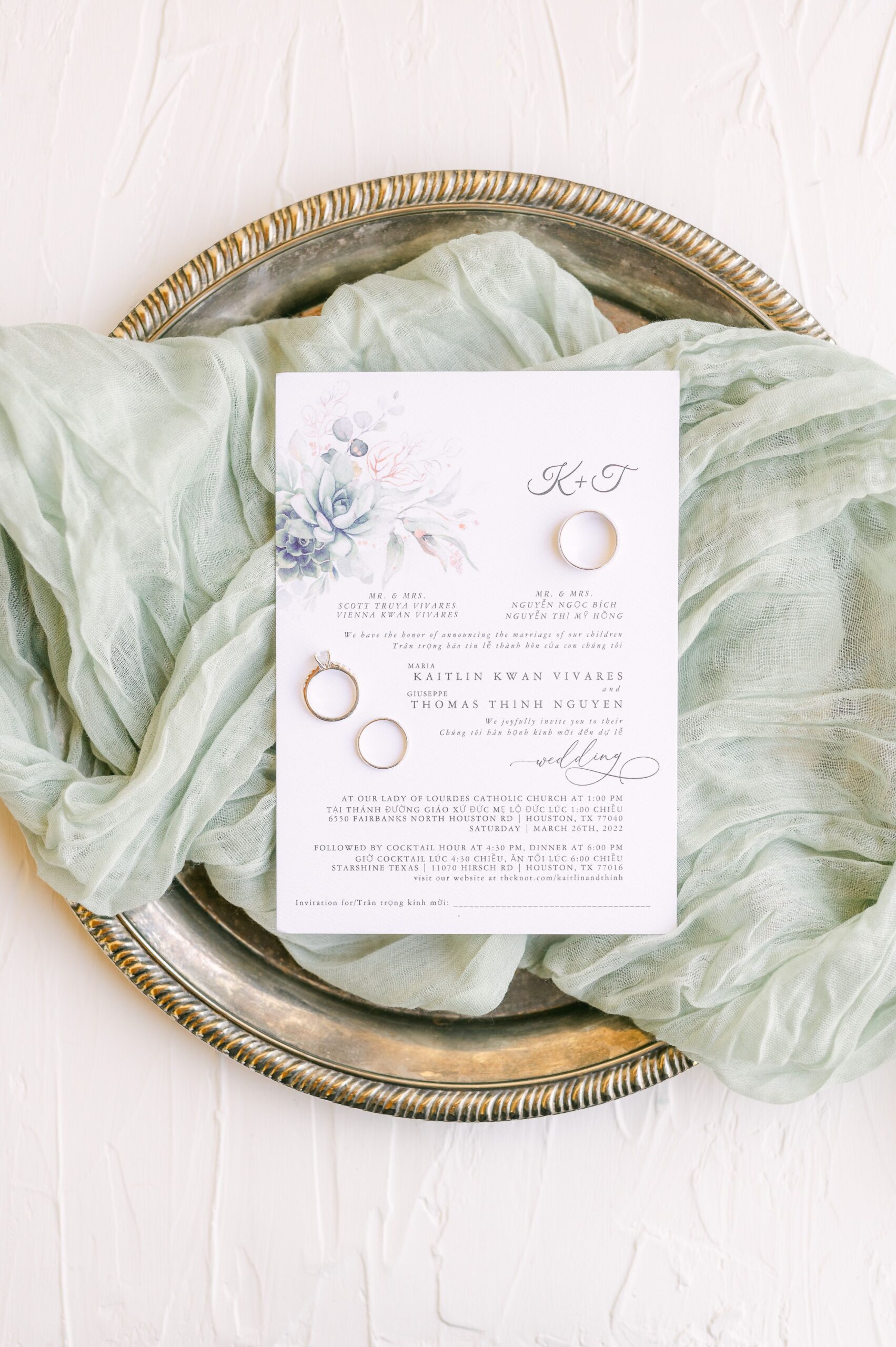 wedding invitation on mint green fabric