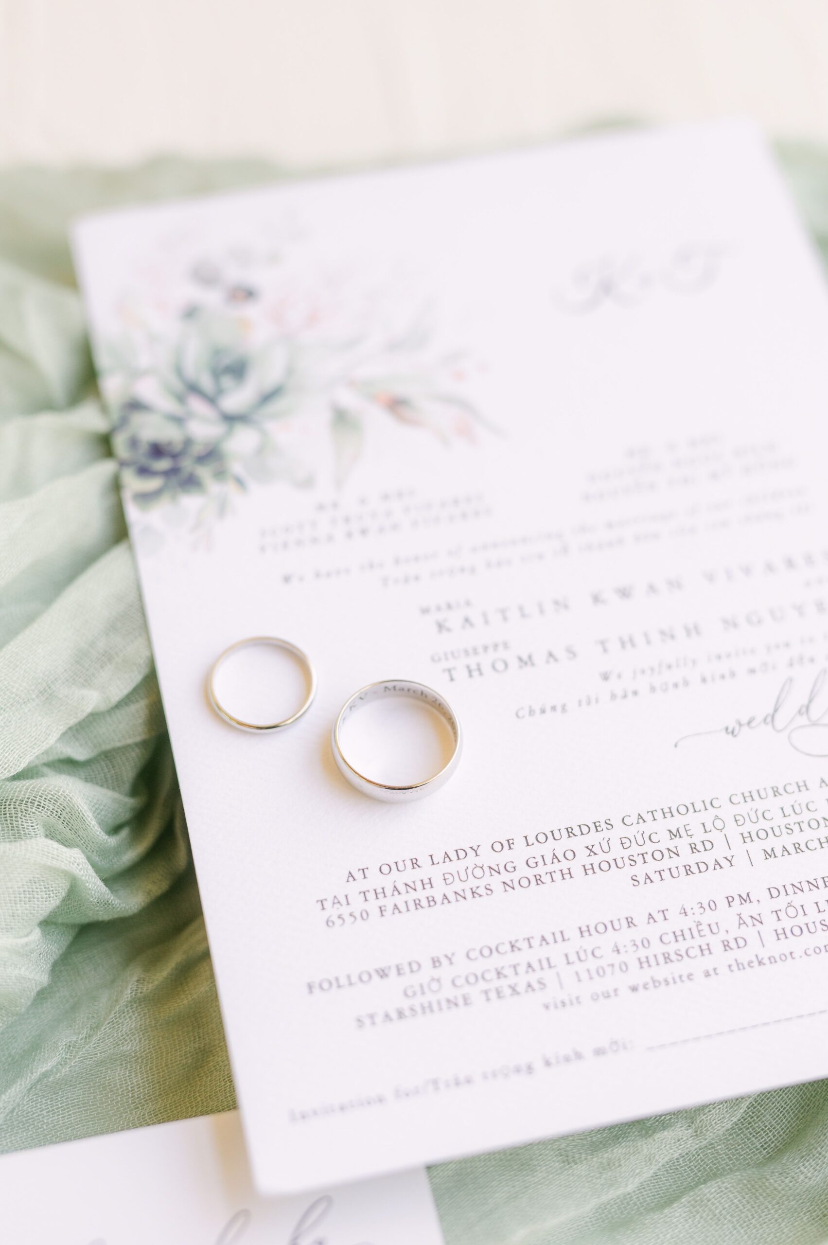 wedding invitation on mint green fabric