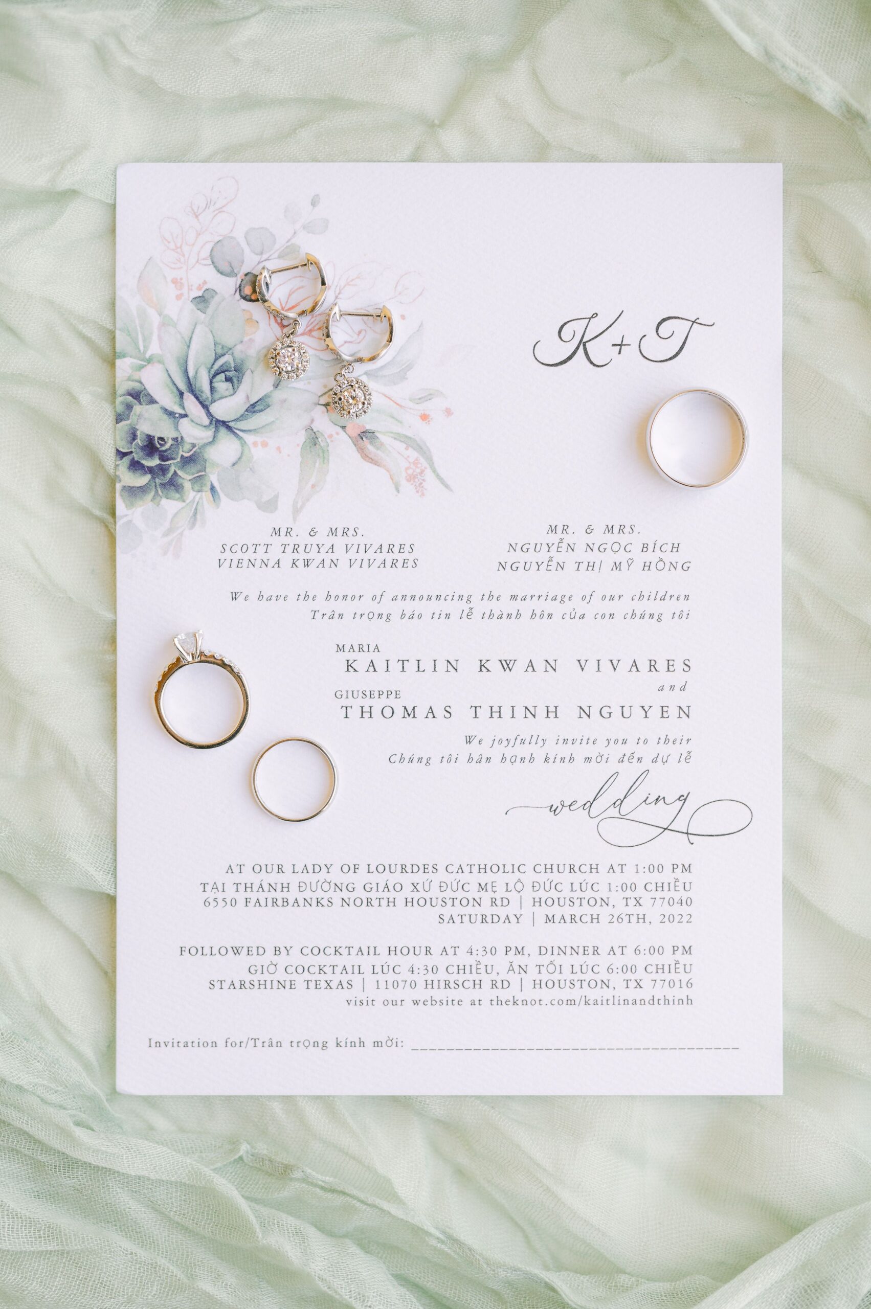 wedding invitation on mint green fabric