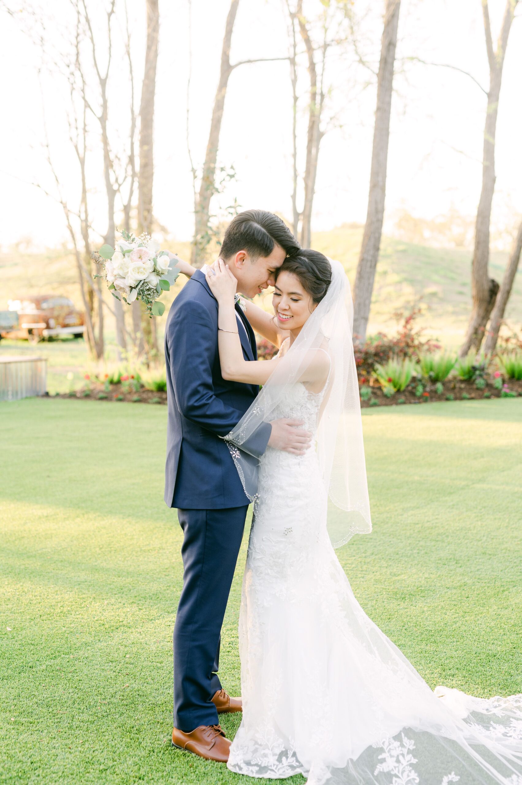 bride and groom at their wedding at Houston rustic wedding venues
