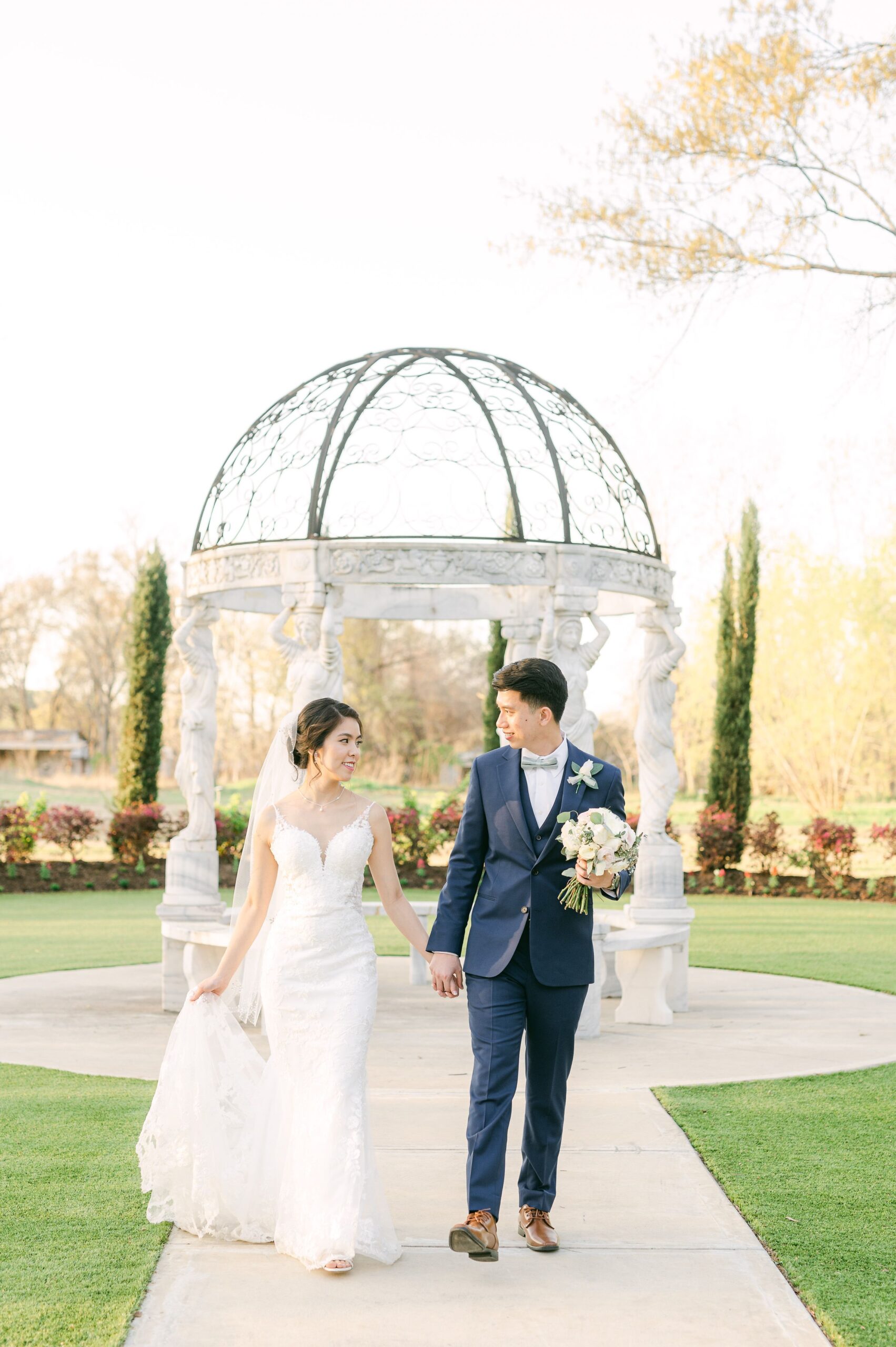 bride and groom at their wedding at Houston rustic wedding venues