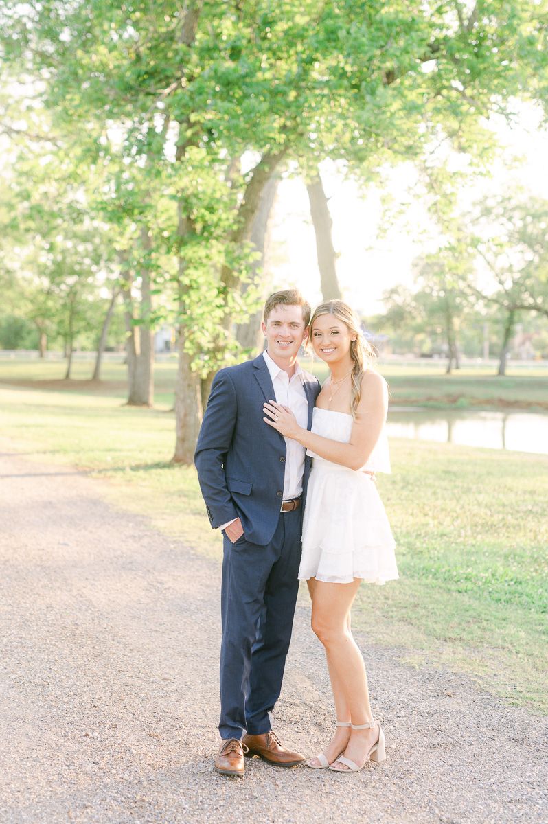 couple near lake during engagement session in Texas