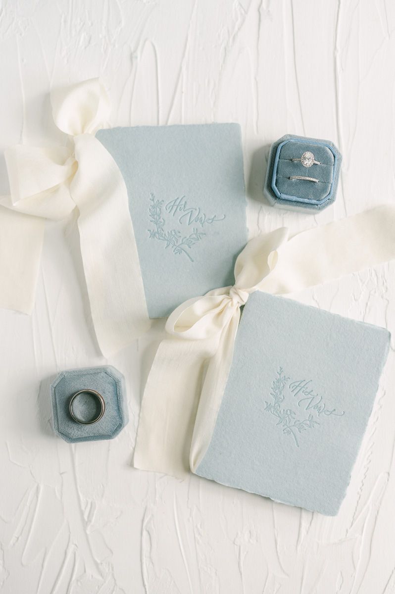 blue vow boxes and wedding rings