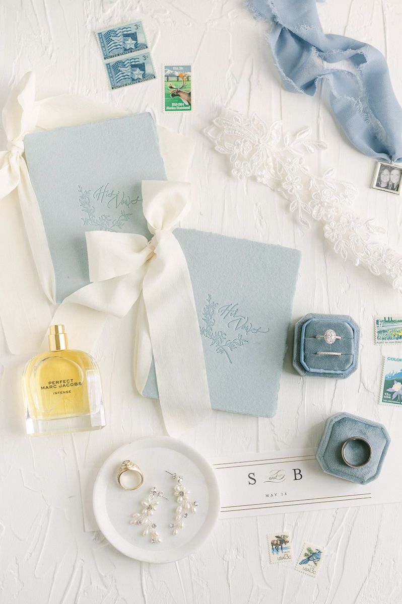blue vow boxes and wedding rings