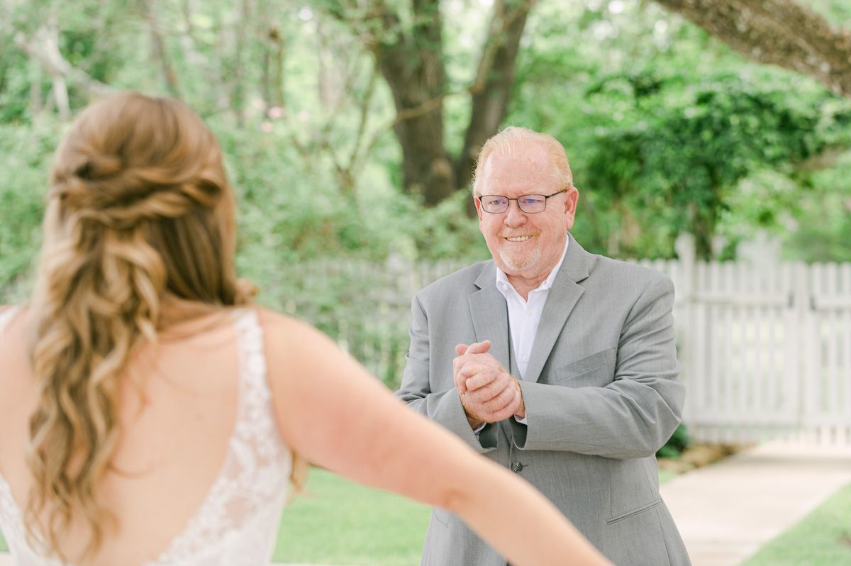 first look with bride and her dad