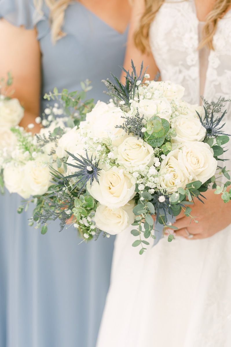white flowers with blue accents for bridesmaids