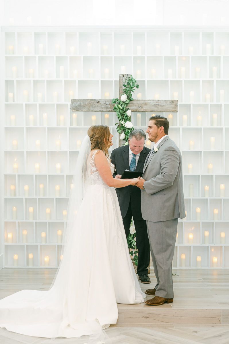 ceremony at The Pattison House with candle wall