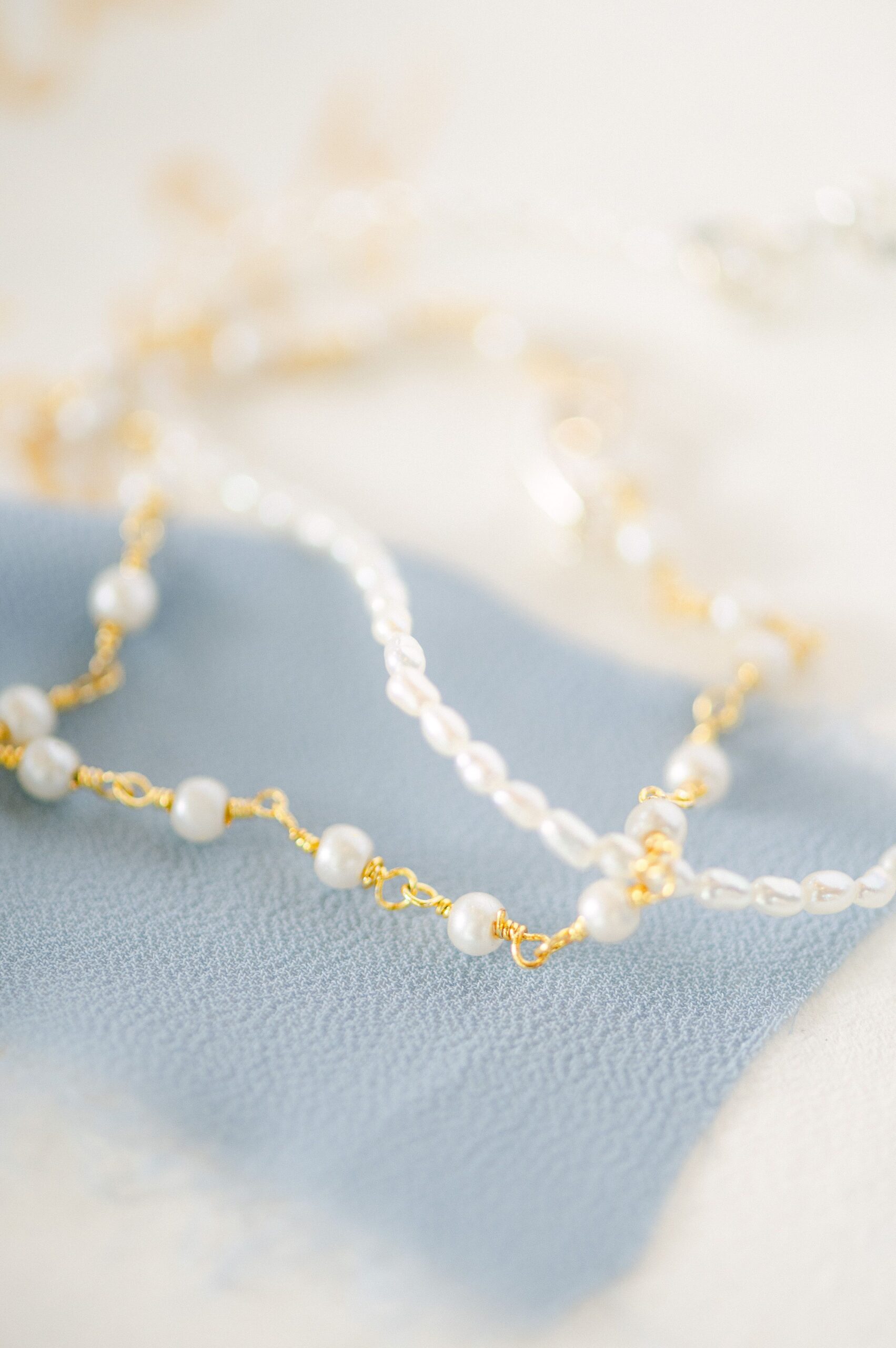 bride's bracelet on blue ribbon