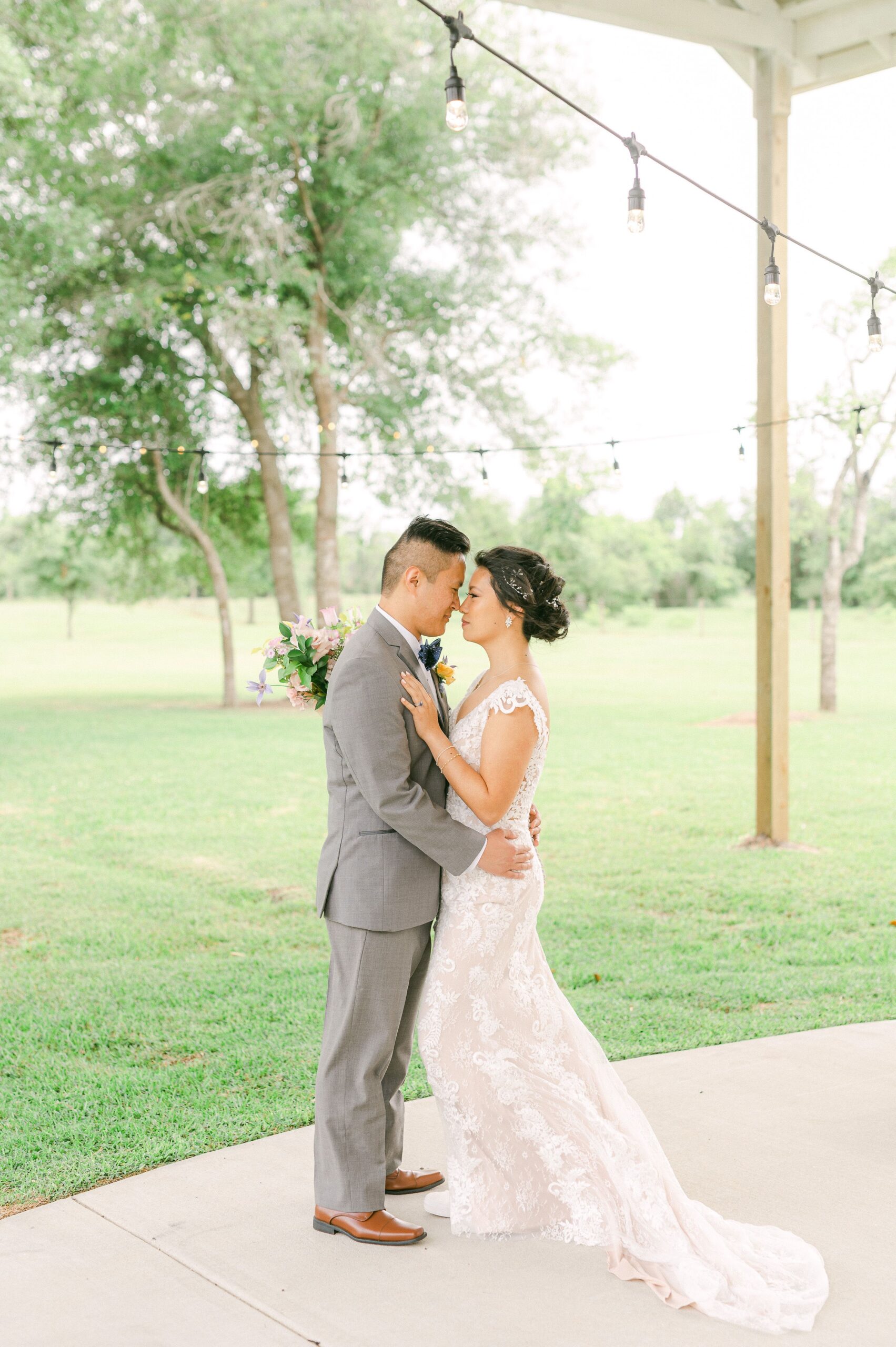 bride and groom cuddling at their wedding in Santa Fe, Texas