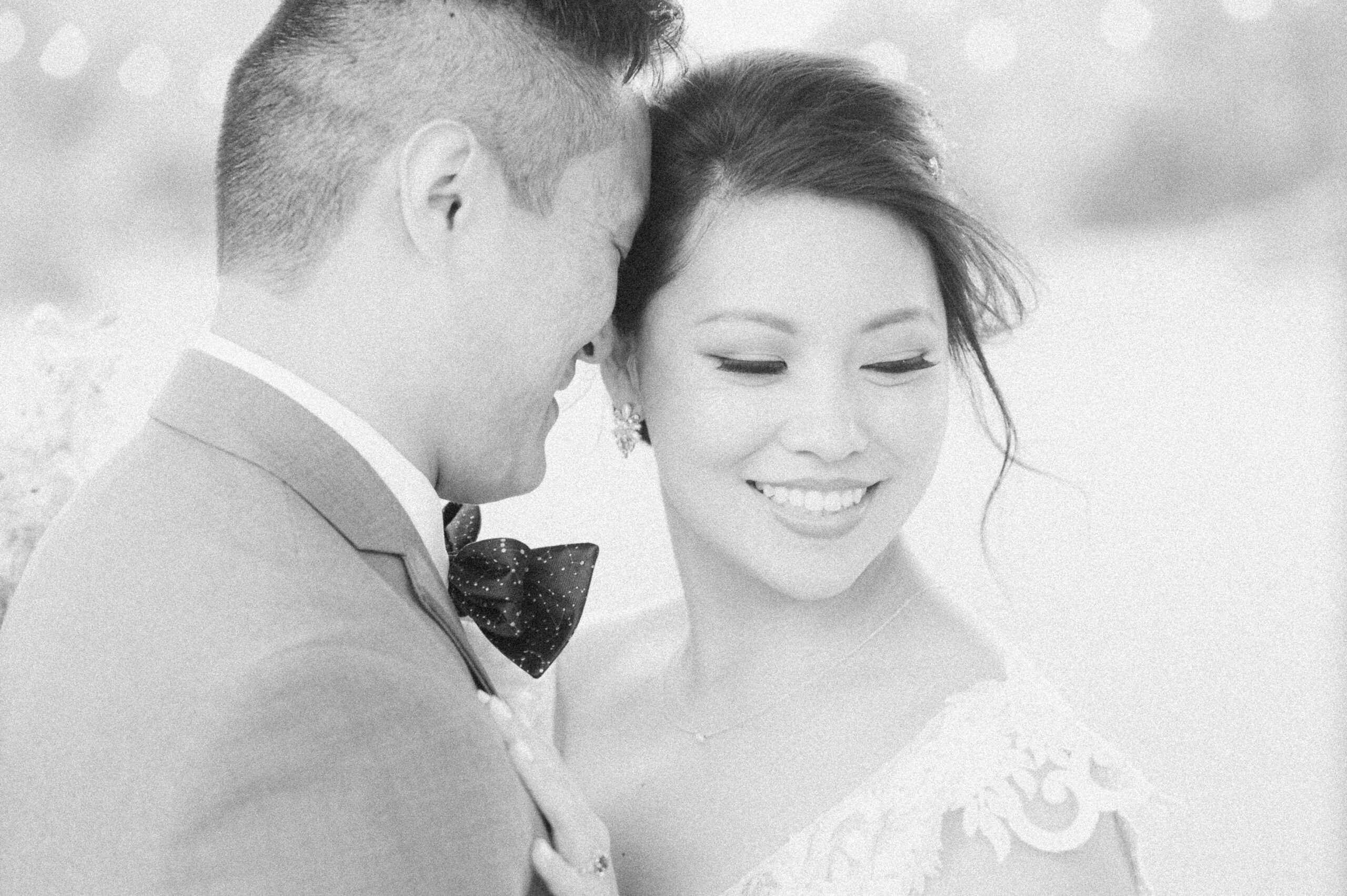 bride and groom cuddling at their wedding in Santa Fe, Texas