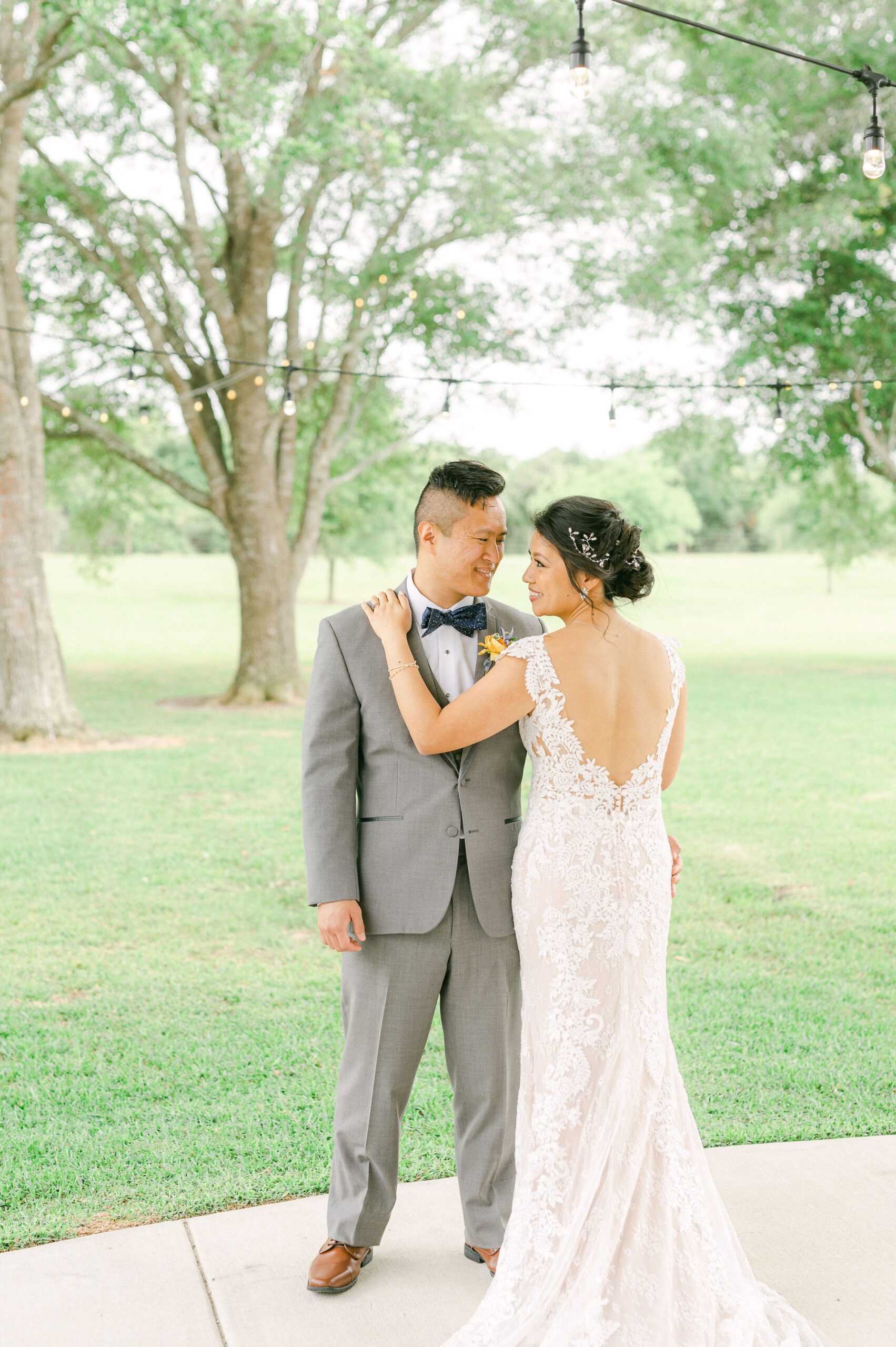 bride and groom cuddling at their wedding in Santa Fe, Texas