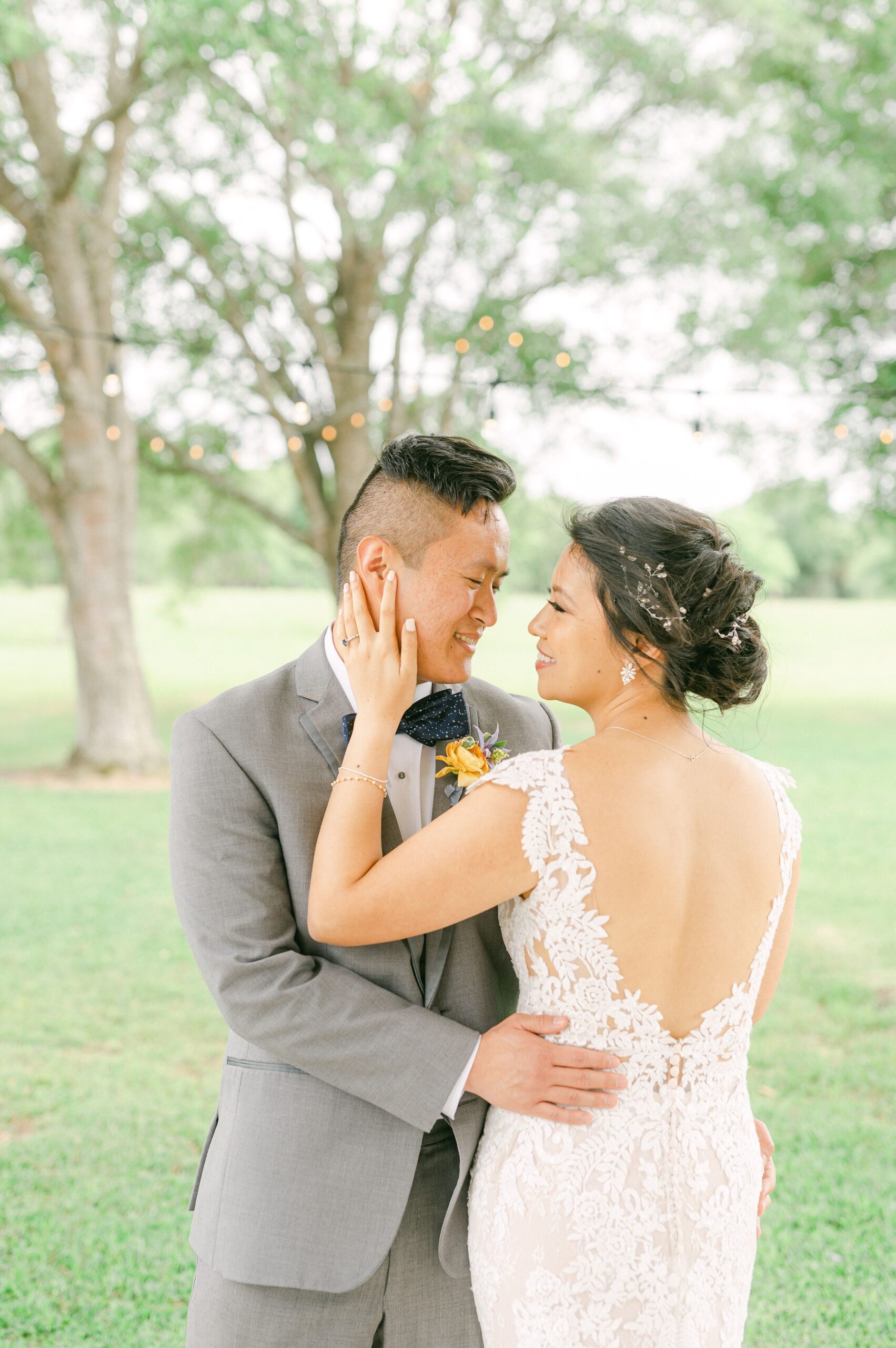bride and groom cuddling at their wedding in Santa Fe, Texas
