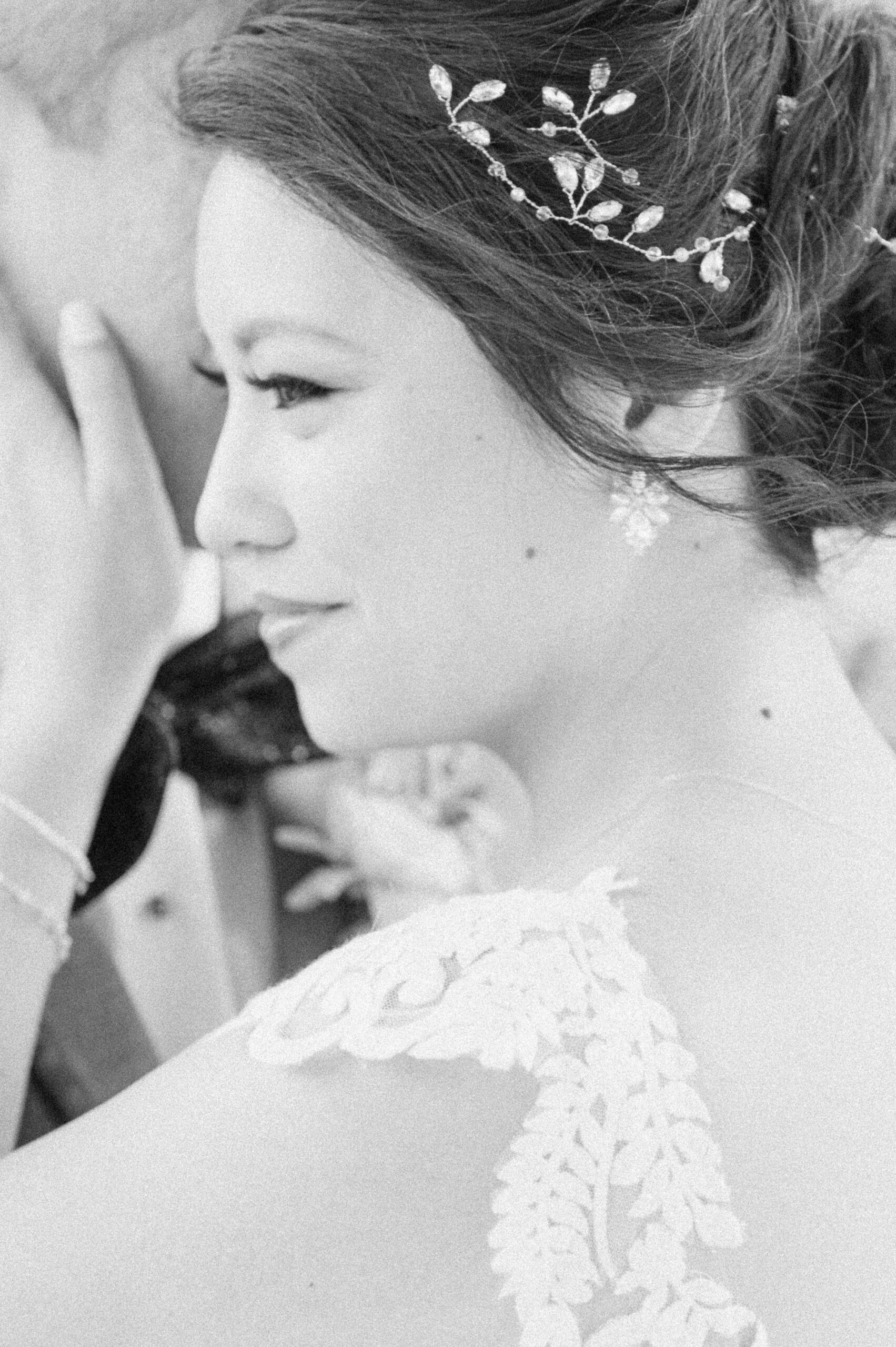 bride and groom cuddling at their wedding in Santa Fe, Texas